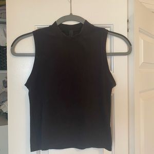 Skims mock neck crop top.
